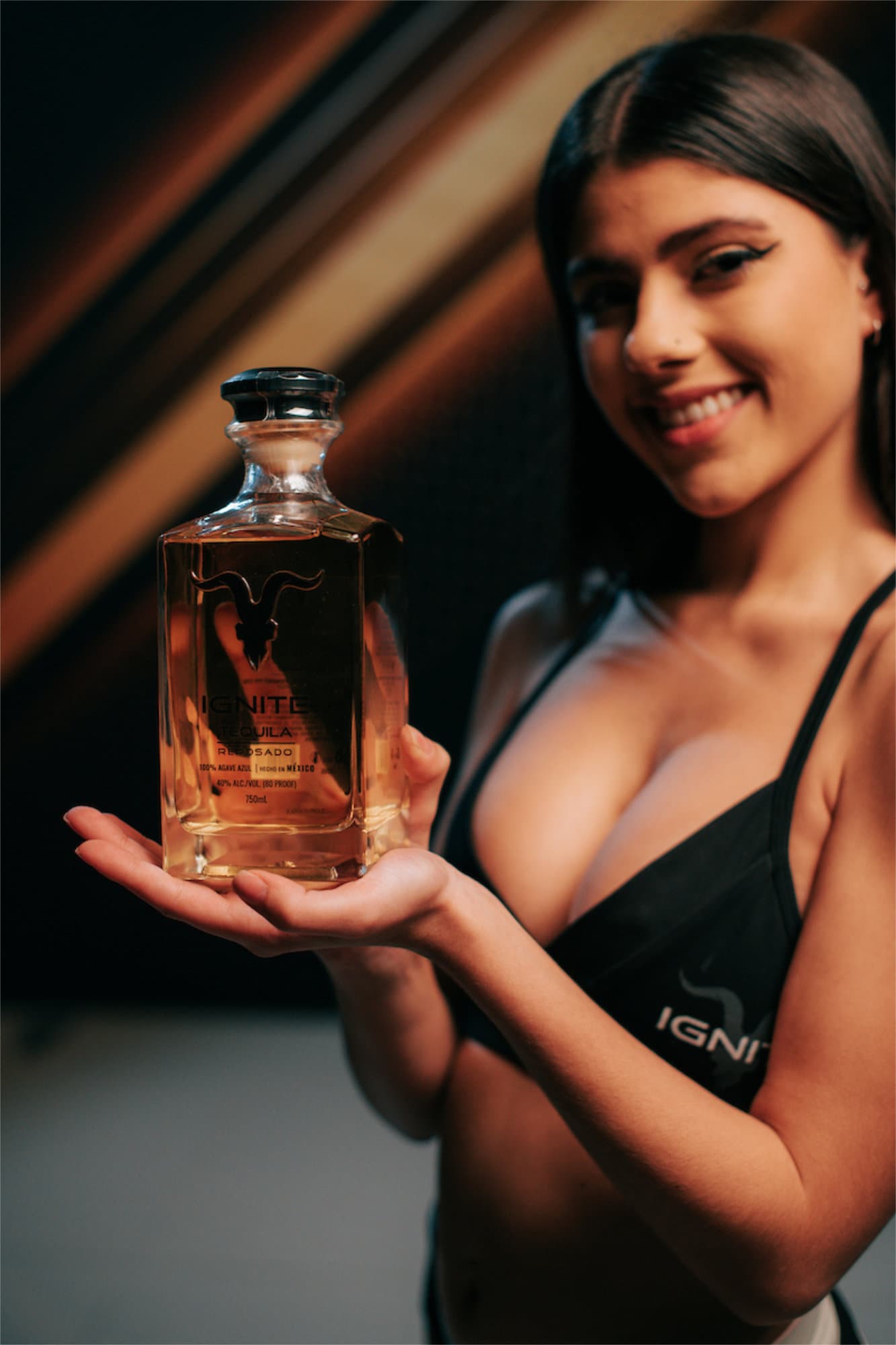EFC ring girl presenting Ignite product at an event